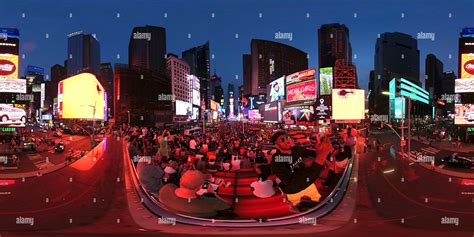 360° View Of 360 Panorama Of Times Square New York At Dusk With Tourist