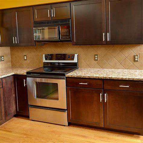 Attach new clean plywood to the sides of your cabinets, then prepare the veneer, cutting it half an inch wider and two inches longer than each vertical stile and horizontal rail. How to Reface the Kitchen Cabinets - DHLViews