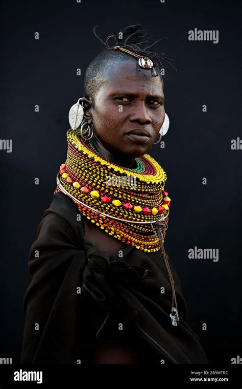 A Married Young Turkana Woman In Traditional Attire At Her Village Near