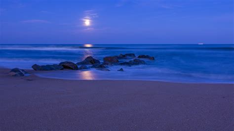 Ocean Beach Sand Stones Night Blue Sky Clouds Moon Hd Wallpaper