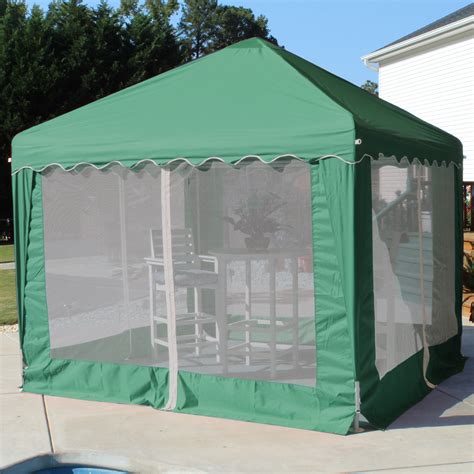 Blue 10′ x 10′ garden party canopy zipped up, the screened sides keep the. King Canopy 10x10 Backyard Garden Party - Green