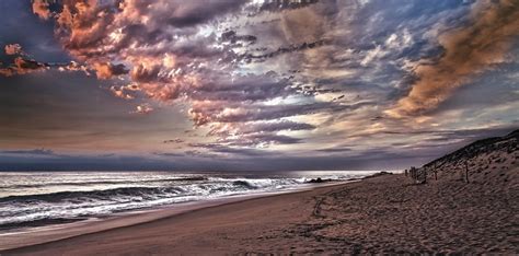 Безплатна снимка плаж море крайбрежие пясък океан хоризонт облак небе изгрев залез