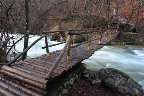 Wooden Bridge Over Mountain River Stock Photo Image Of Safety Brown