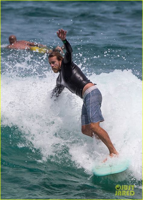 Simon Baker Goes Scruffy While Catching Waves In Sydney Photo