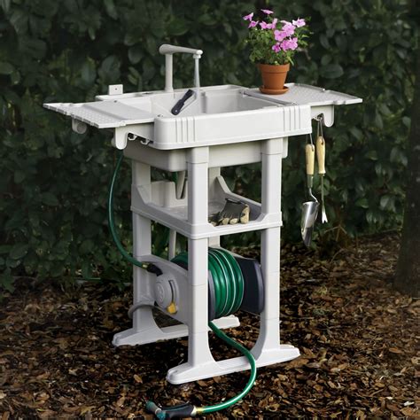 Outdoor sink station with hose reel. The Portable Outdoor Sink - Hammacher Schlemmer