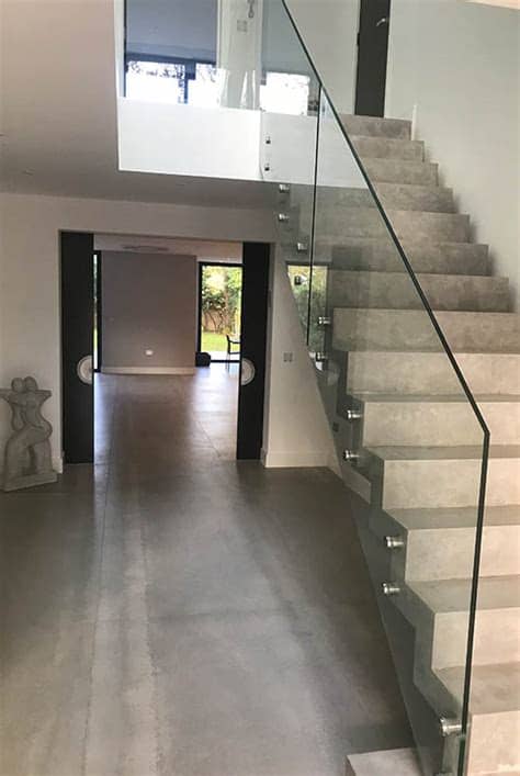 A handrail with its supporting posts. Glass Balustrades in Stevenage & St Albans | Stevenage ...
