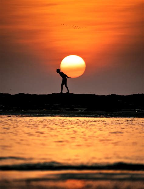 Indian Photographer Creates Spectacular Silhouette Sunset Illusions On