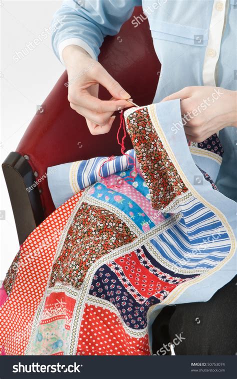 Close Up Of Womans Hand Stitching Quilting Stock Photo 50753074