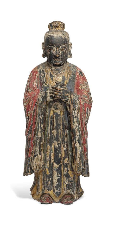 A Polychrome Decorated Carved Wood Standing Figure