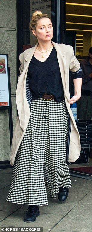 Amber Heard Is Stylish In Beige Coat And Checkered Skirt As She Goes