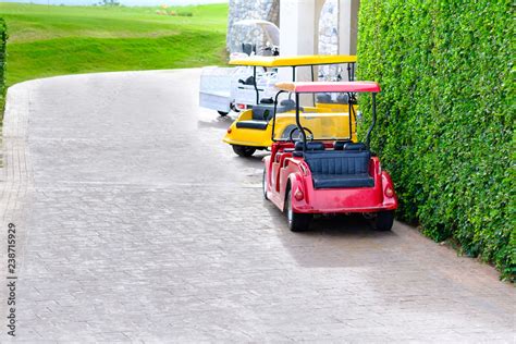 Redyellowand White Gilf Car Are Parking At Golf Club Stock 写真 Adobe