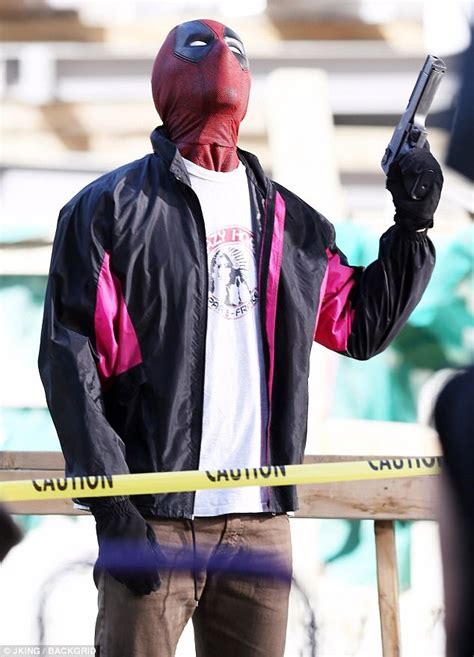 Ryan Reynolds Totes Gun On Set Of Deadpool 2 Daily Mail