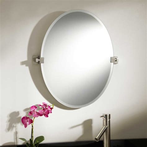Allied brass frameless oval tilt beveled edge wall mirror, unlacquered brass. 24" Helsinki Oval Tilting Mirror - Modern - Bathroom Mirrors