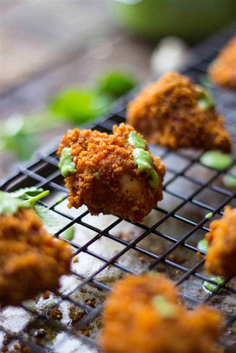 I dare even say that chicken nuggets are possibly our favorite food. Chili-Corn Crusted Chicken Nuggets with Avocado Yogurt Dip