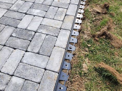 Installing The Paver Edging For Our Diy Concrete Paver Walkway
