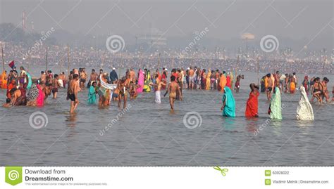 Hindu Devotees Come To Confluence Of The Ganges River For Holy Dip