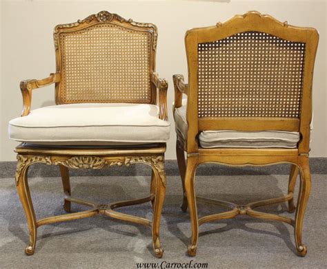 36″ h , overall width, 23″. Antique French Walnut Carved Cane Back Arm Chairs at 1stdibs