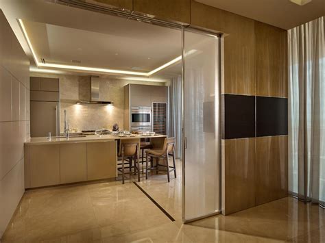 White Modern Kitchen With Sliding Door Hgtv