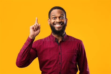 Excited Black Man Having Great Idea And Pointing Up Stock Photo Image