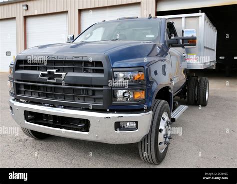 A 2019 Chevrolet Silverado 6500 Hd Chassis Cab Truck Is Upfitted With A