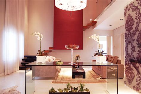 Amazing gallery of interior design and decorating ideas of console table under window in bedrooms, living rooms, dens/libraries/offices, dining rooms, bathrooms, entrances/foyers by elite interior designers. Beautiful Bright Living Room with Glass Console Table ...