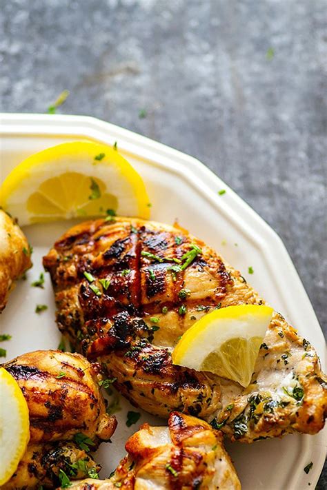 The tangy marinade adds tenderness and flavor to everyday plain chicken breasts. Pin on Garlic chicken recipes