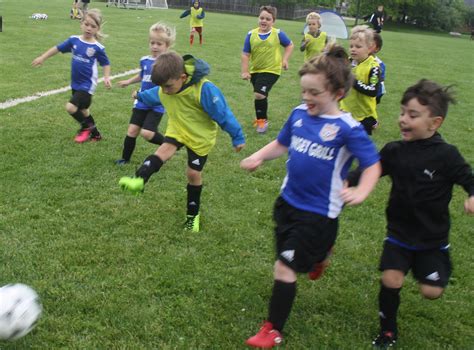 Everything you ever wanted to know about soccer clubs and players. Soccer game gets kids running