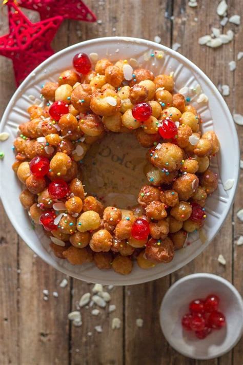 Struffoli are italian honey balls, small crunchy balls of dough mixed with honey and candy toppings. Struffoli Italian Honey Balls, delicious crunchy pastry ...