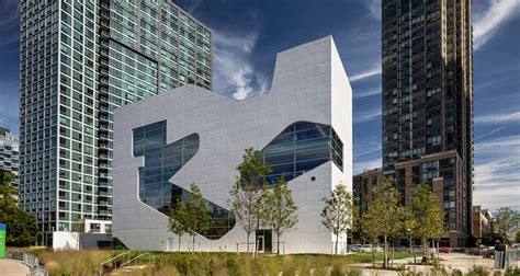 Steven Holl Punctures Concrete New York Library With Sculpted Cuts