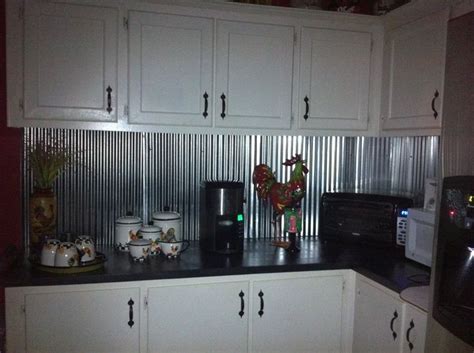 A glass sheet can be cut into any size to fit into your backsplash. Rustic and Western | Tin backsplash kitchen, Metal ...