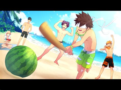 Some People Are On The Beach And One Is Holding A Watermelon In His Hand
