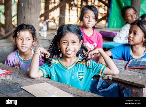 Cambodian School Children Smile For The Camera In A School In The
