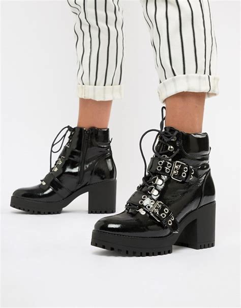 missguided patent chunky sole biker heeled boots in black asos