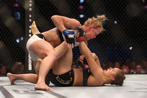 12 Breathtaking Photos From Holly Holm’s Dominant Victory Over Ronda Rousey For The Win