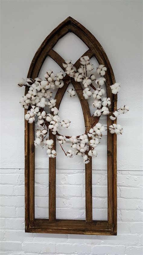 Well you're in luck, because here they come. Architectural wood window with cotton wreath. Farmhouse ...