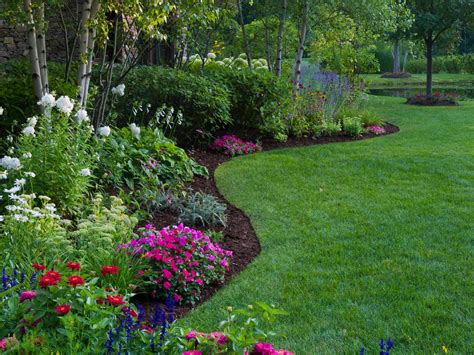 You can create one continuous, smooth curved border by using concrete as your edging material. Best Garden Border Ideas | DIY Network Blog: Made + Remade | DIY