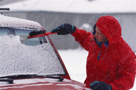 Scraping Snow Off Windshield Stock Image C0273543