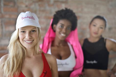 Free Photo Three Woman Wearing Of Red White And Black Sport Bras Active Hat Wear Free