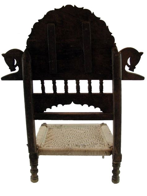 National handicrafts has vast group of talented expert and creators who is prepared in their field. Antique Indian Folding Carved Teak Pida Low Chair For Sale at 1stdibs