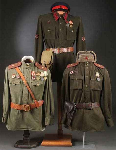 a group of three russian soviet wwii uniforms