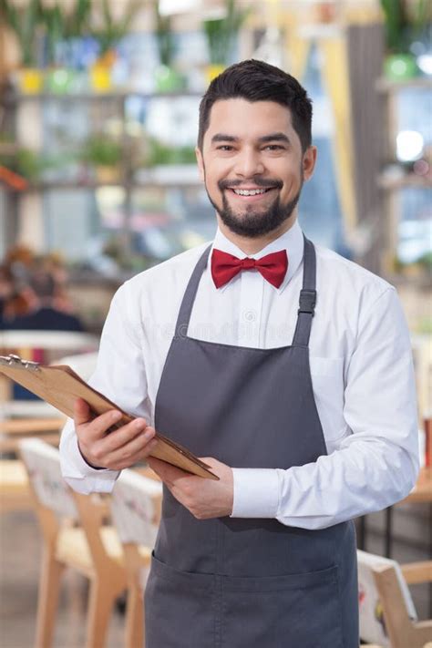 Waiter Looking Folder Stock Photos Free And Royalty Free Stock Photos