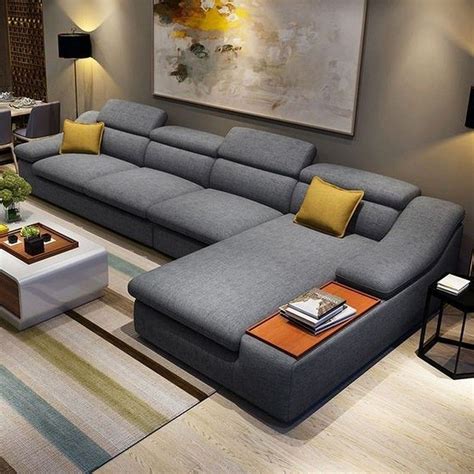 Дизайнерские диваны для гостиной в современном стиле 90 фото