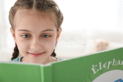 Cute Girl Reading Book At Home Closeup Stock Image Image Of Leisure
