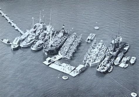 A Picture Showing The Salvage Fleet And The Two Pontoons Of The Neptune