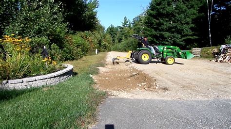 Using 6 Landscape Rake On A John Deere 2032r To Rake Rocks In Driveway