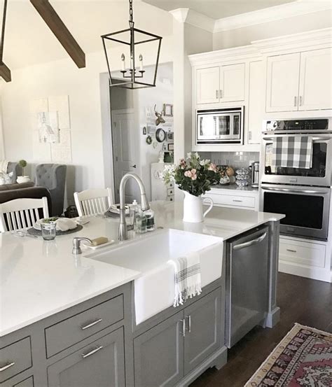 White and gray painted cabinets, countertop and backsplash choices and update ideas for any style of kitchen. Cabinet colors Sherwin Williams Gauntlet gray Snowbound ...