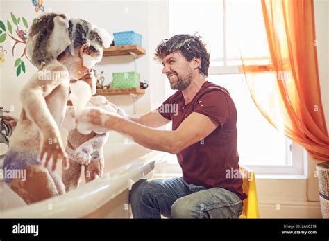 Playful Father Giving Babes Bubble Bath Stock Photo Alamy