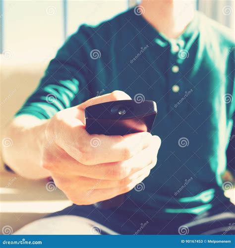 Young Man Using Tv Remote Control Stock Image Image Of Happy Remote