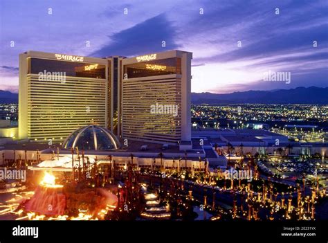 The Mirage Hotel On The Strip In Las Vegas Nevada At Dusk With Volcano