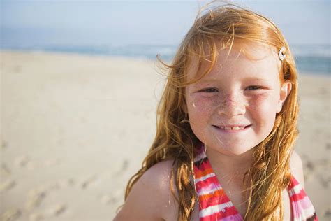 A Smiling Young Girl Enjoys A Sunny Photograph By Ty Milford